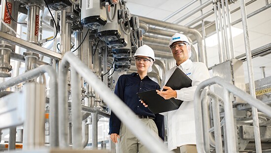 Cosmetics manufacturer consulting with an Ecolab Life Sciences expert