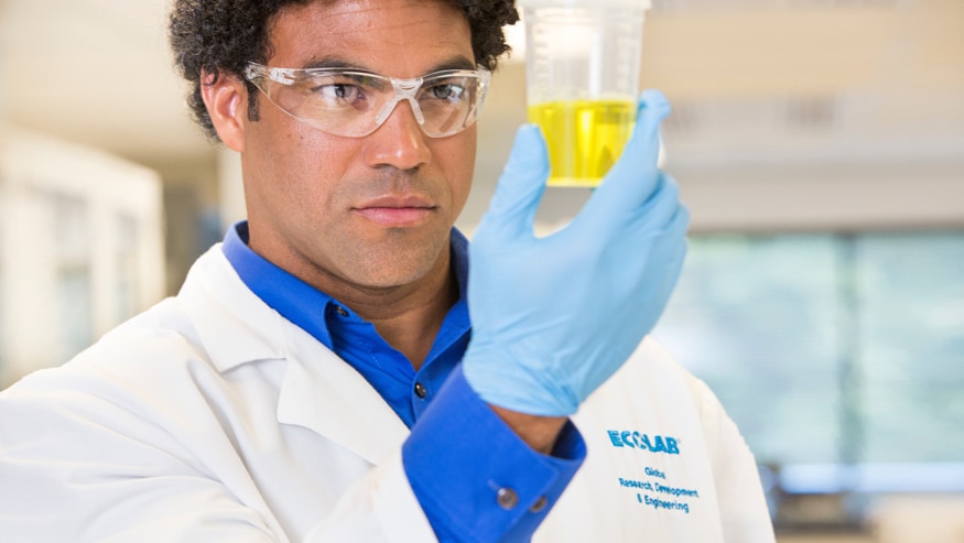 Ecolab scientist in a lab coat