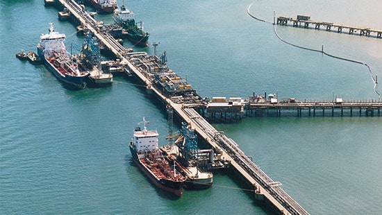 Dock with multiple crude oil storage tankers
