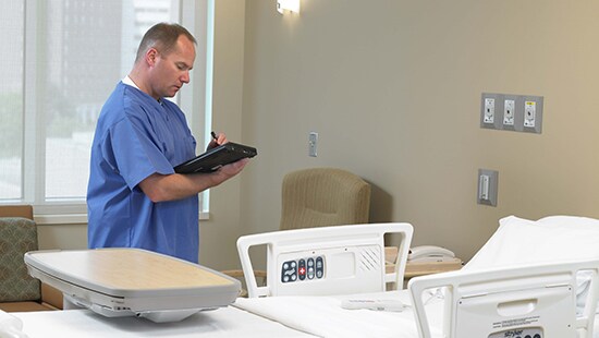 Auditor performing a baseline in patient room